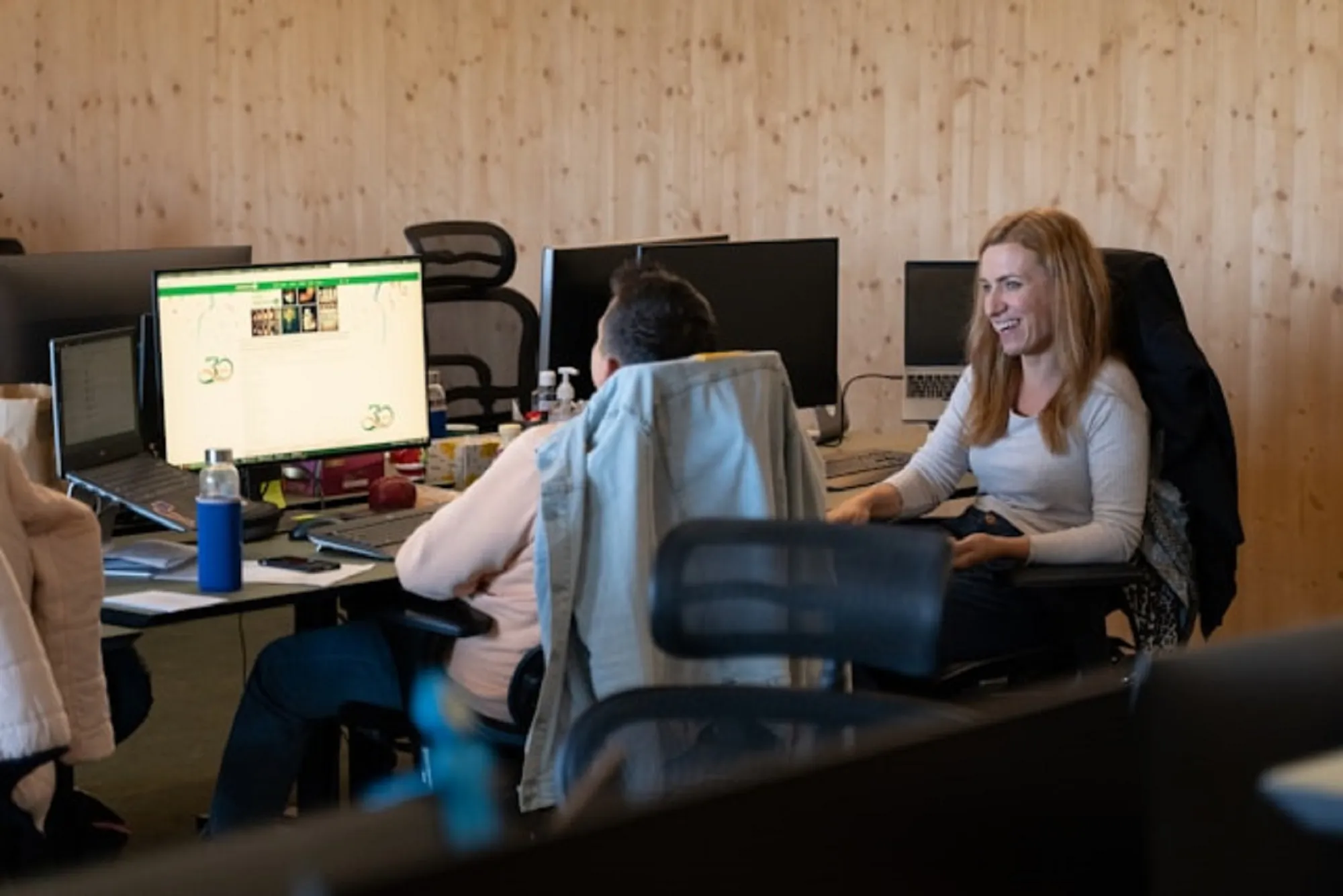 People sitting in front of computers